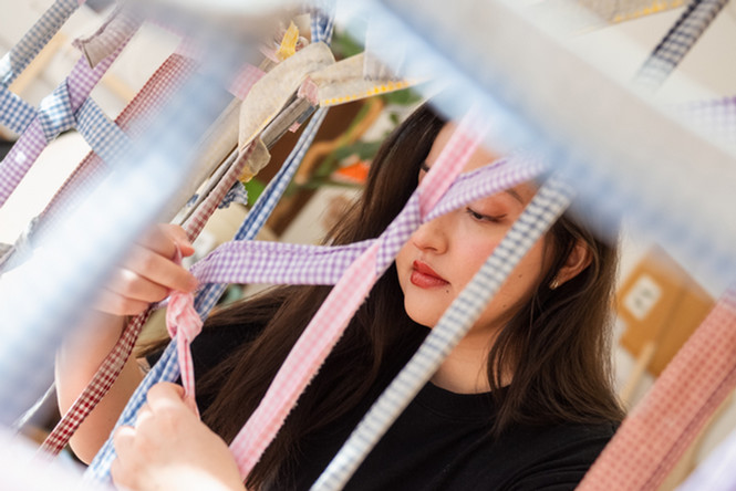 Image of students and faculty in art studio