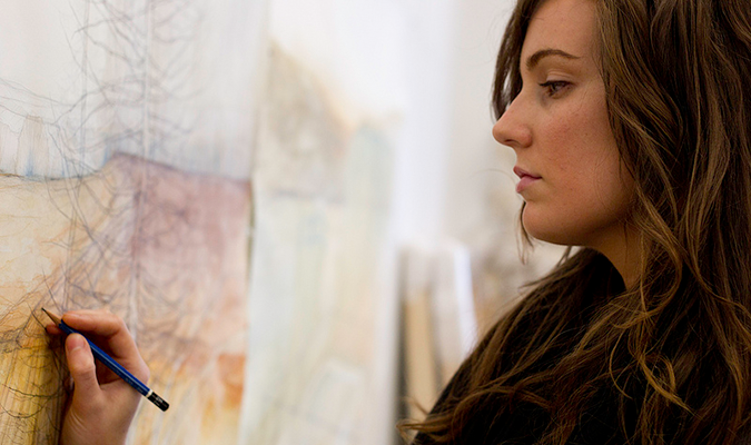 Image of a student in the drawing studio