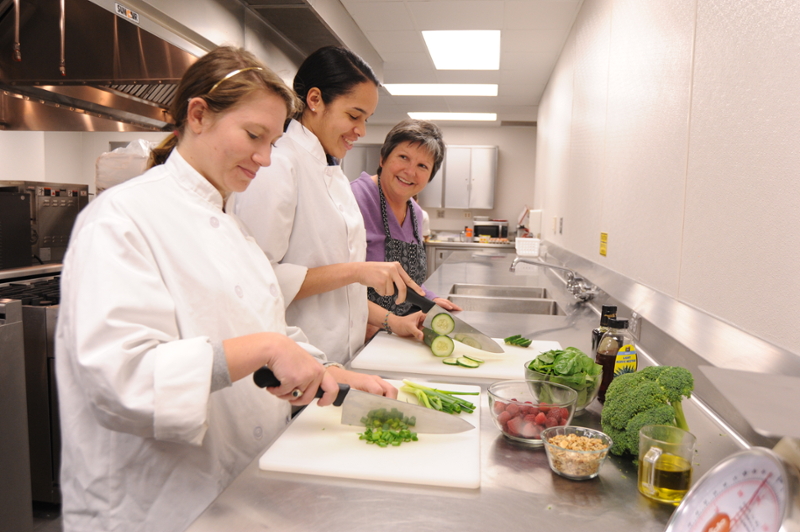 condrasky-working-with-students-in-culinary-lab.jpeg