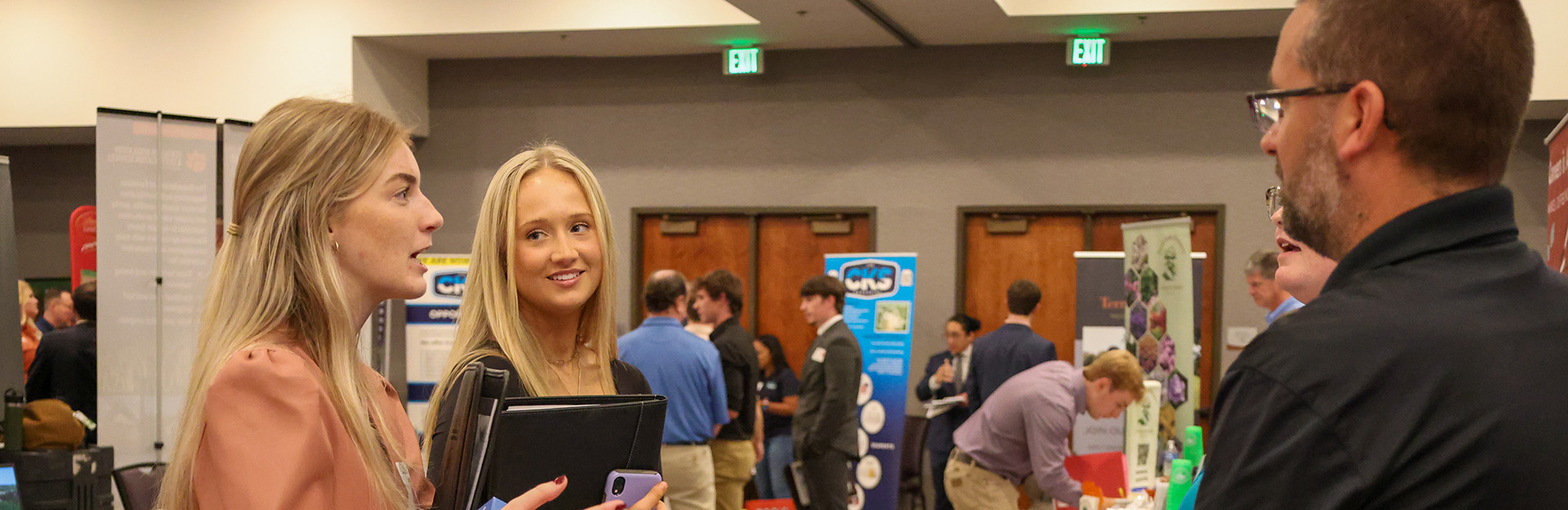 2 photos of students actively working at their industry internship placement