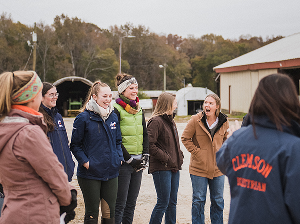 group of laughing girls at the equine center