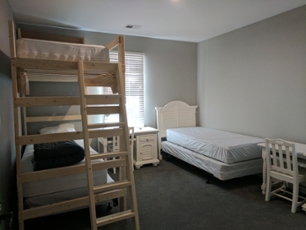 cottage bedroom with bunk beds