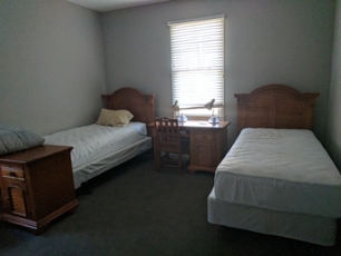 cottage bedroom with single beds