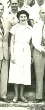 1950 photograph of Peggy Sullivan on the front steps of Building 1 (USDA,1950)