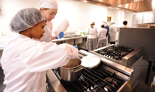 Dr. Aubrey Coffee, sensory lecturer in the Department of Food, Nutrition and Packaging Science in her Culinary Lab