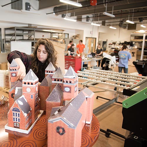 student working in a packaging lab