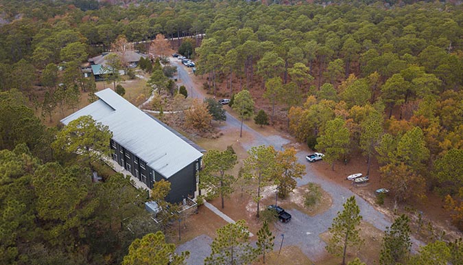 Baruch Institute building surrounded by forest