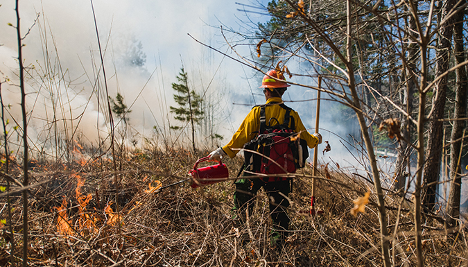 students from clemson's fire tigers working a controlled fire