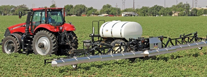 tractor spraying pesticide