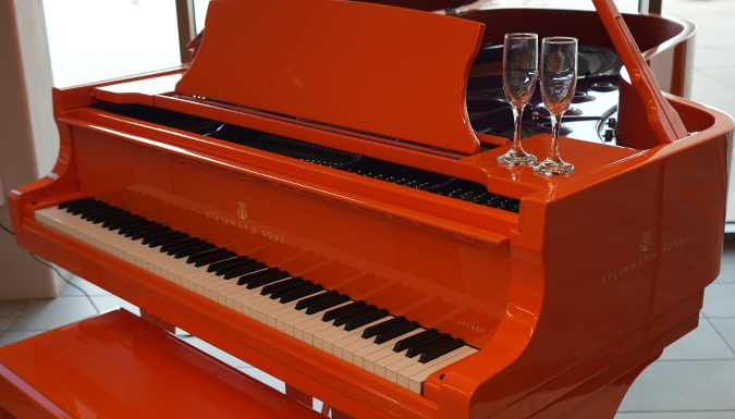 An orange piano