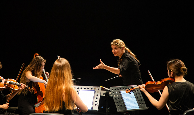 an orchestra performs