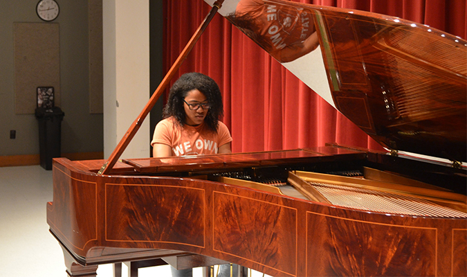 Student plays piano