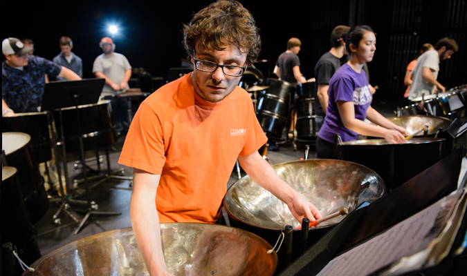 Student plays steel drums