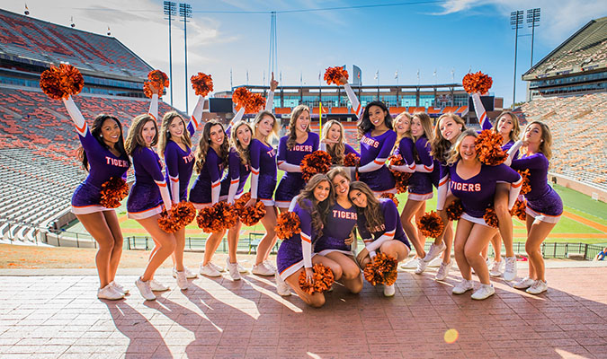 Tiger dancers in front of stadium