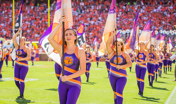 Tiger Band color guard on the football field