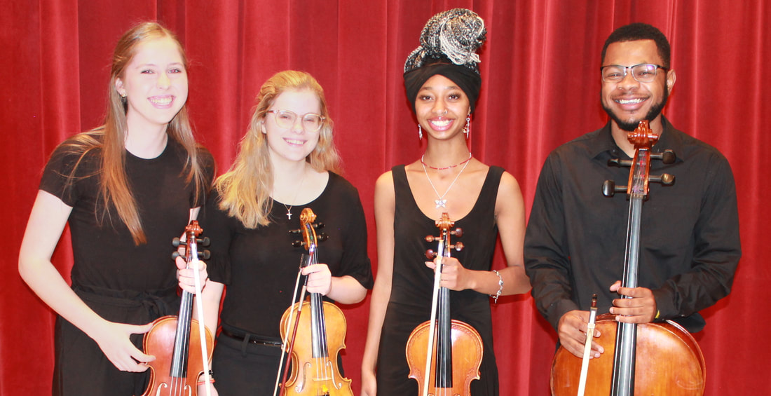 a string quartet poses for a photo