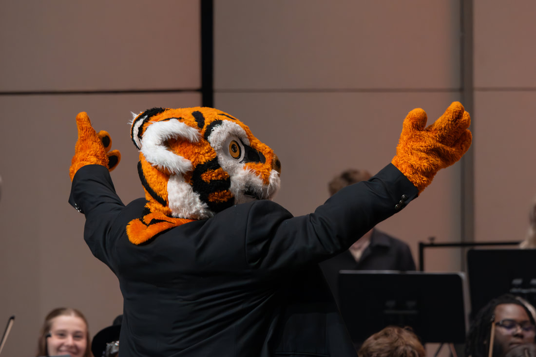 The Clemson Tiger conducts the orchestra