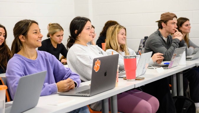 People smiling in a classroom