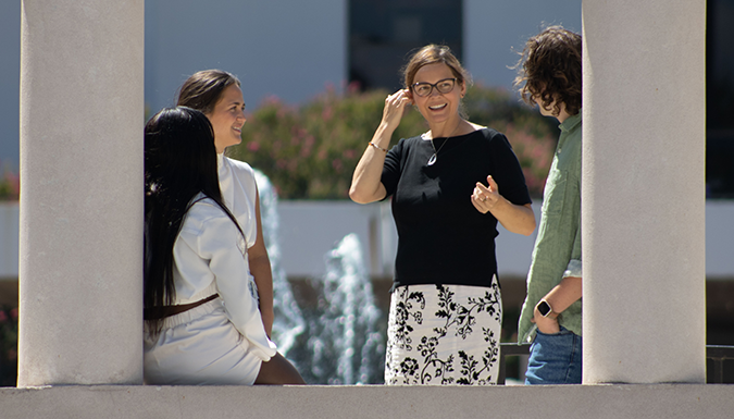 People having a conversation between pillars