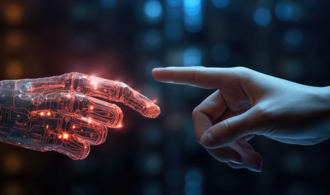 image of a human hand touching the hand of an android