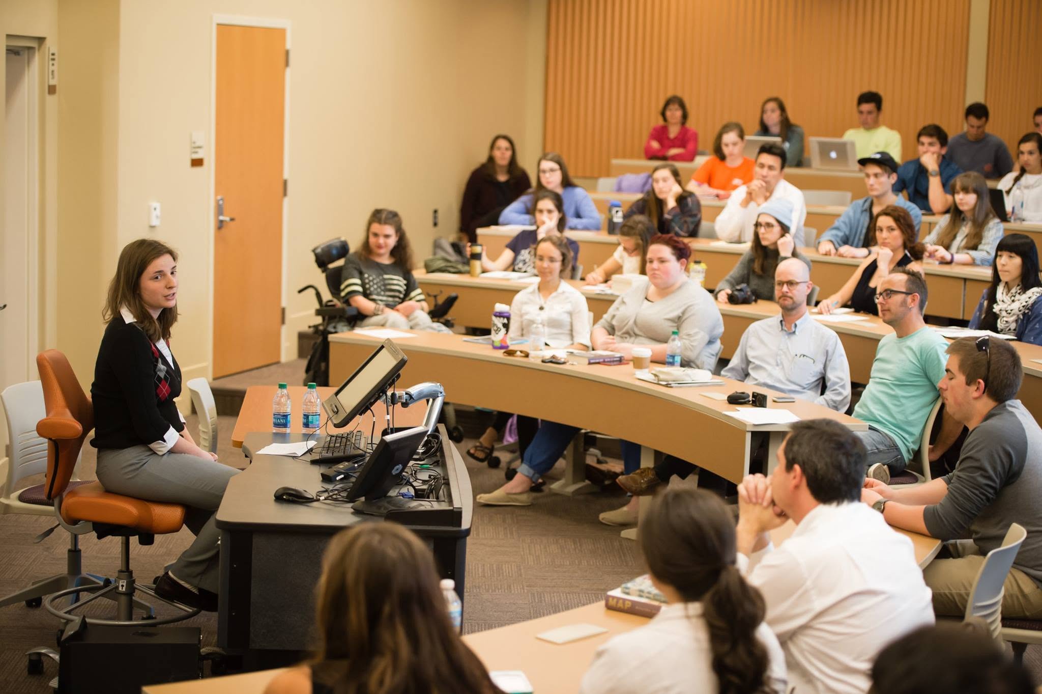 Female presenting to audience during Clemson Literary Festival in 2017.