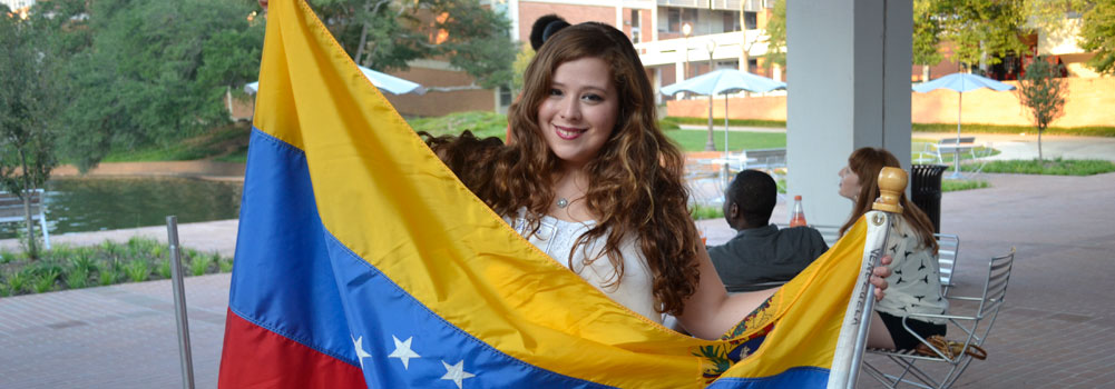 International student with flag  at Clemson University, Clemson South Carolina
