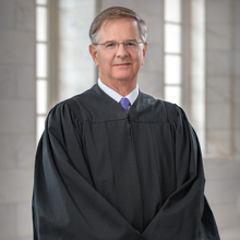 Justice James headshot