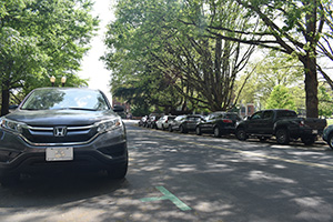 Car in an employee on street parking space