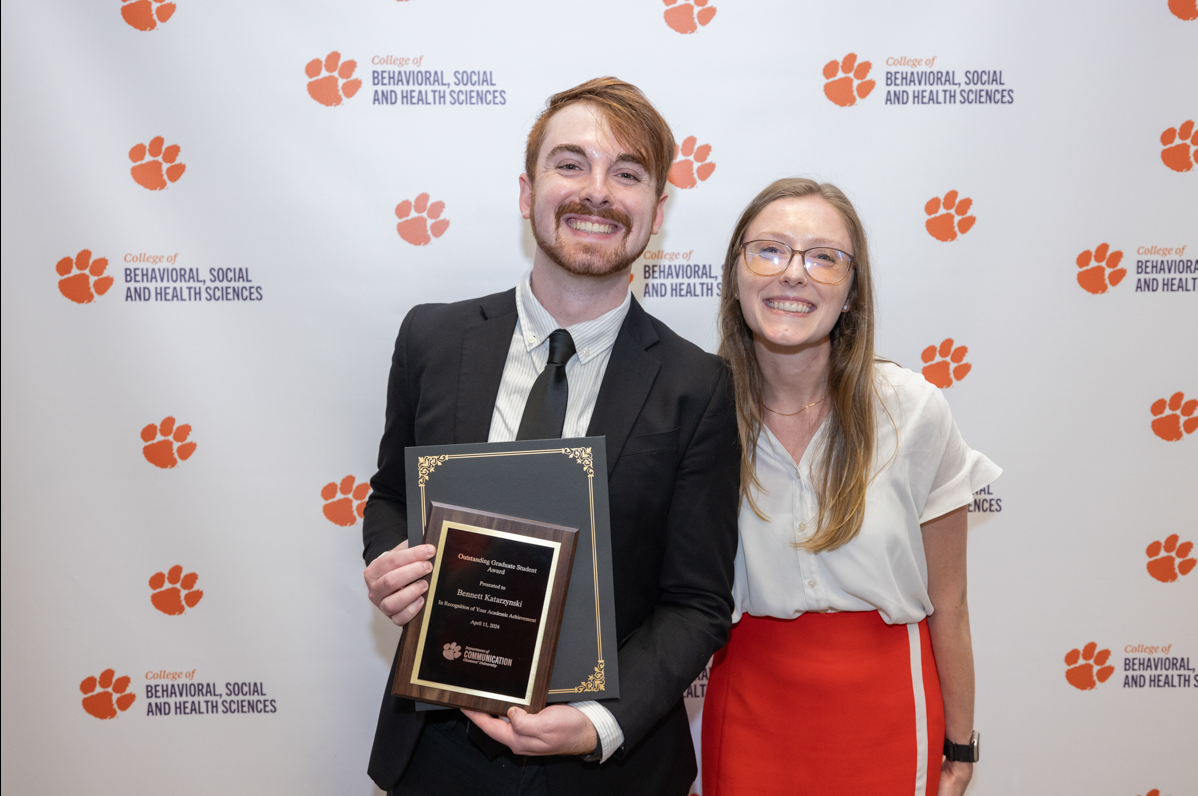 Image of a Student being presented with an award