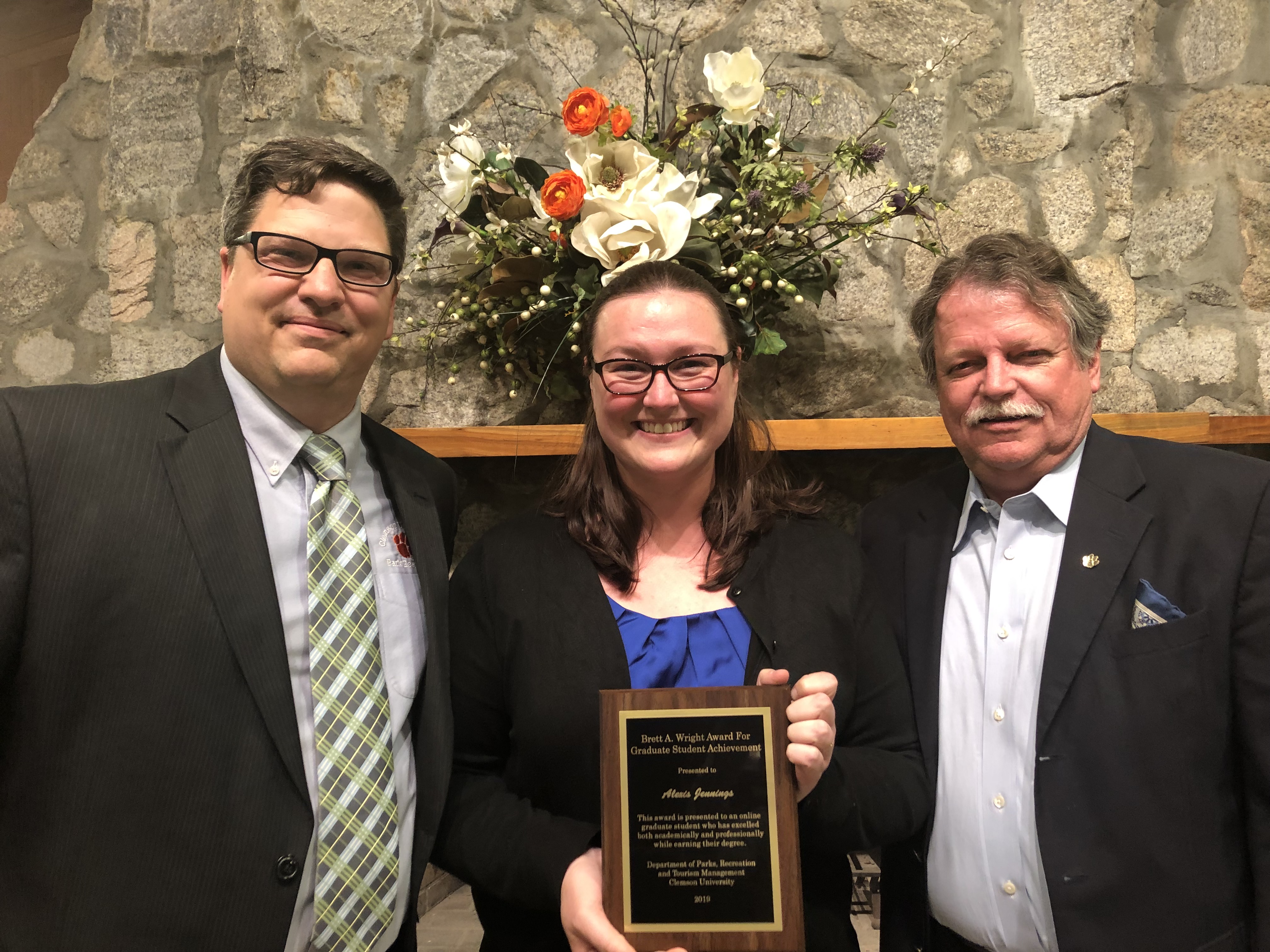 Photo of Interim Chair Dr. Jeff Hallo with award recipient Alexis Jennings and Dr. Brett Wright.