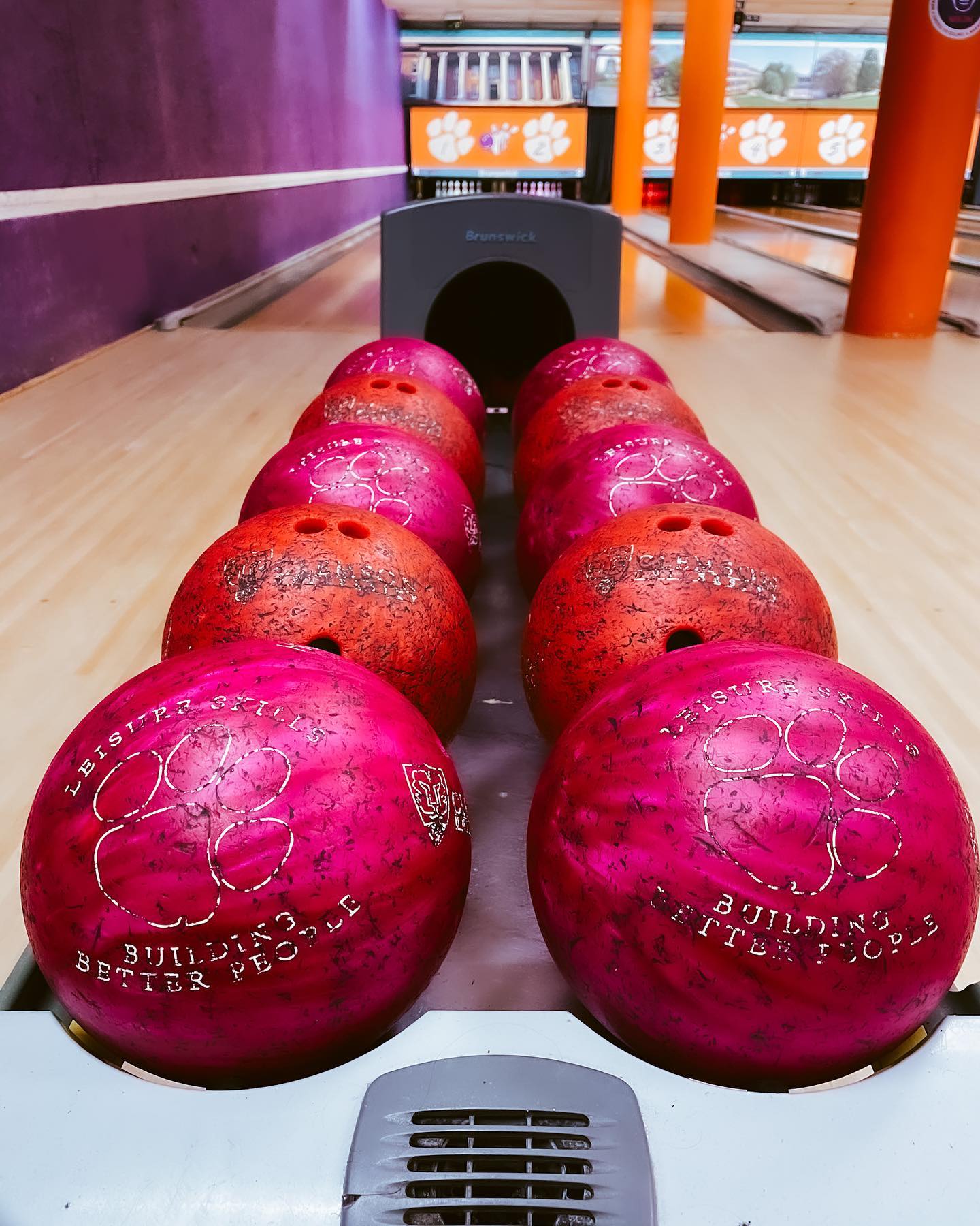 Photo of bowling balls in the bowling alley at the Underground Recreation Center.