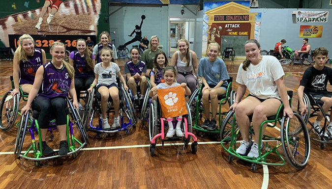 Picture of EDGE students with the Sporting Wheelies in Queensland. 
