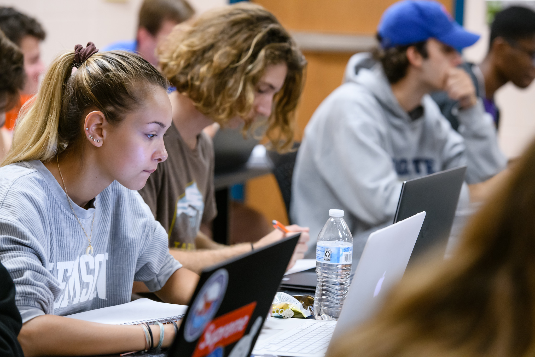 Clemson students working on laptop computers