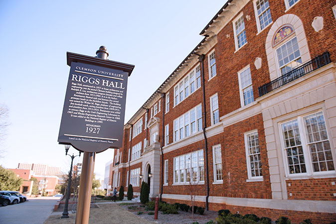 Riggs Hall exterior with information sign in front