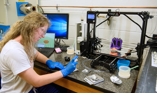 Female at work station