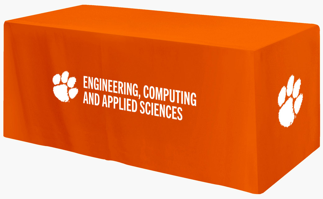 Table covered in an orange cloth featuring the CECAS logo on the front
