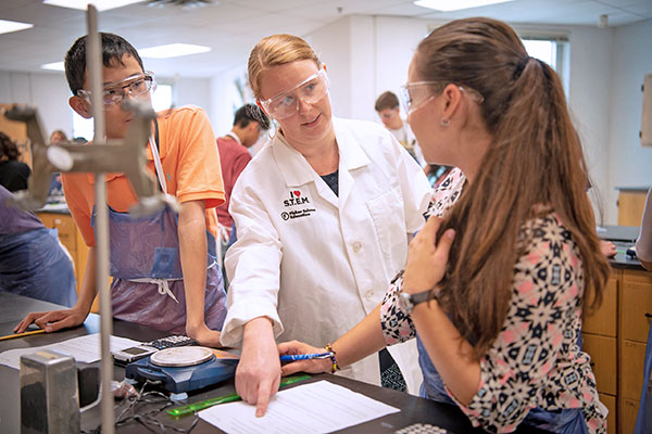 Science teacher in lab