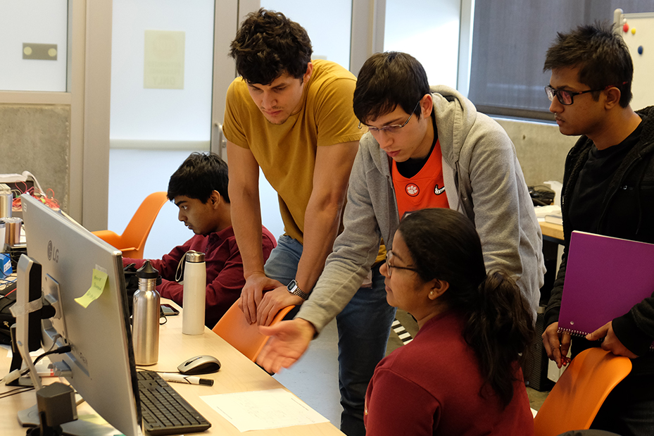 Students discussing vehicle concepts