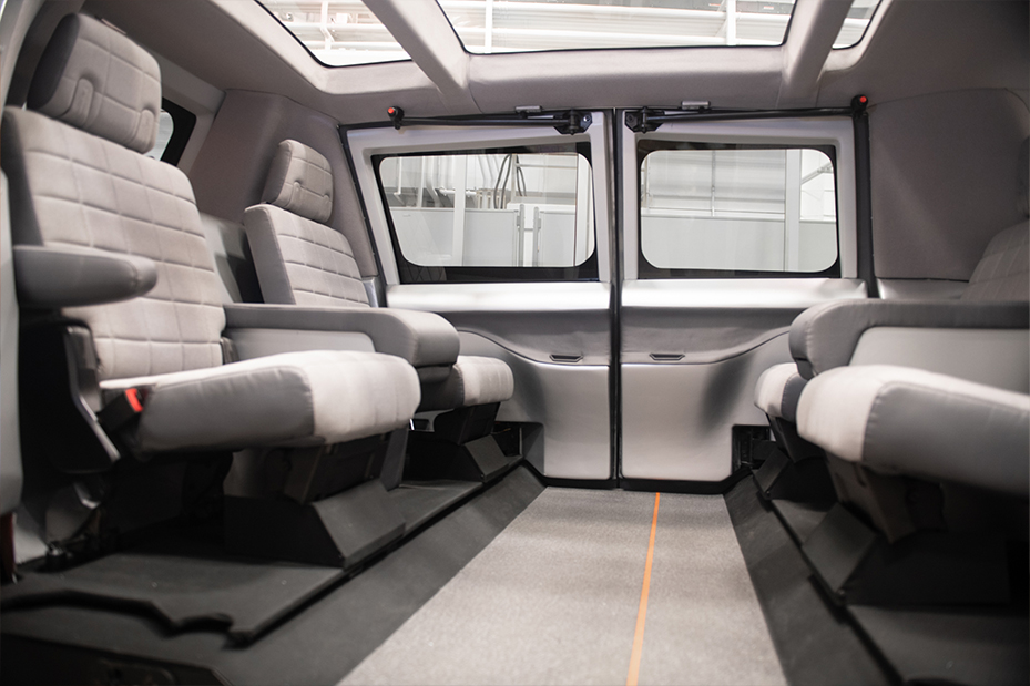Interior of the concept vehicle showing rows of seats facing each other