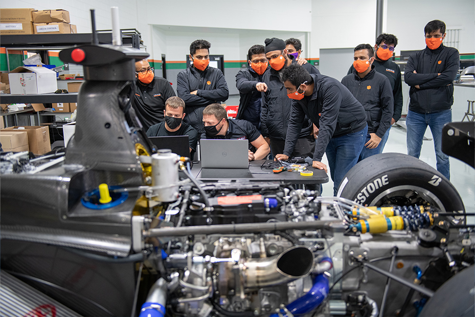 DO12 team examines the vehicle