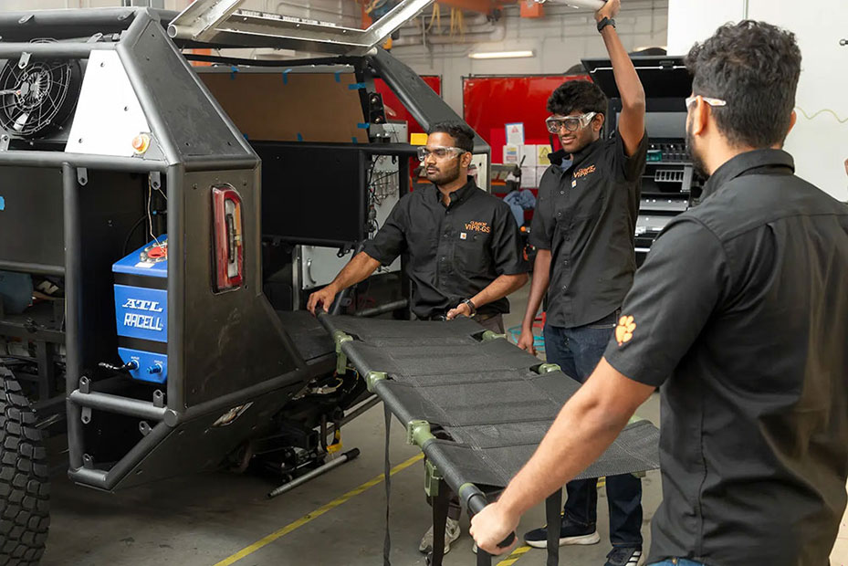 Students install loading mechanism