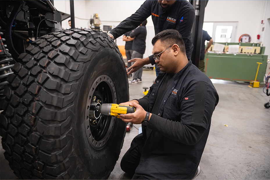 student working on wheels