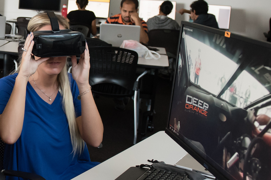 Female with VR goggles reacts to DO9 simulation