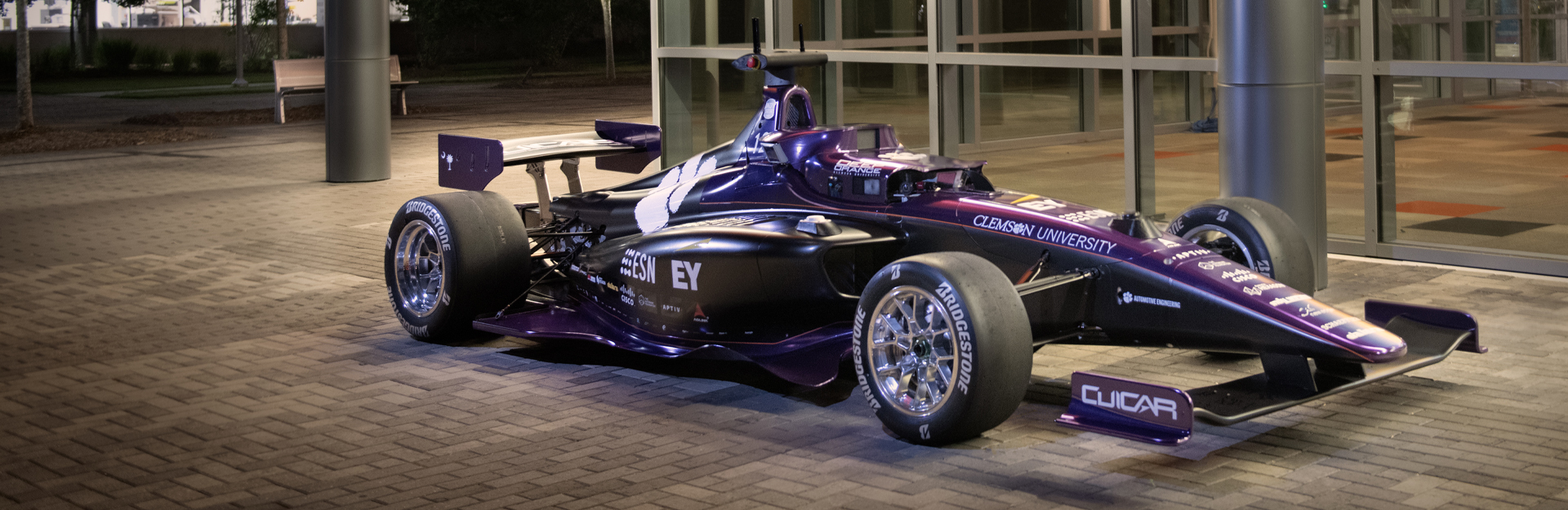 Deep Orange 12 Autonomous Car in a dimly lit parking lot