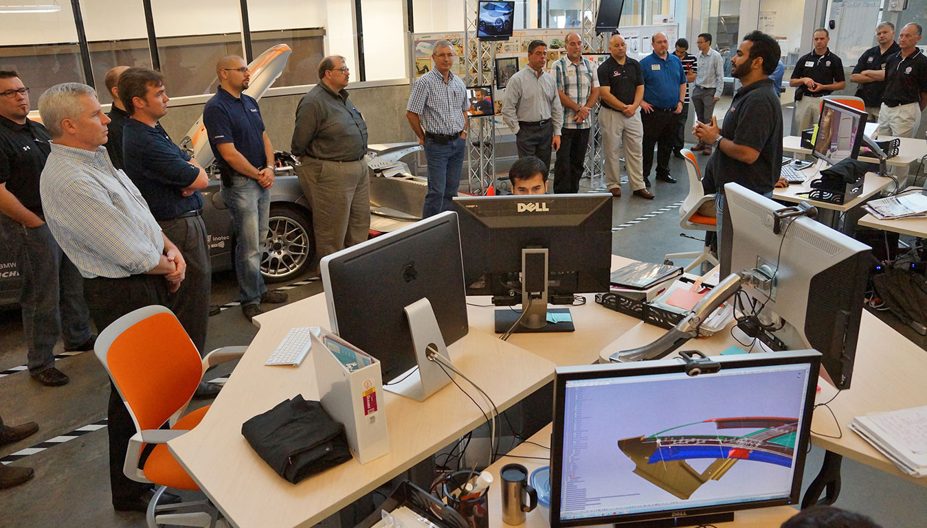 Team members provide project sponsors with a project update