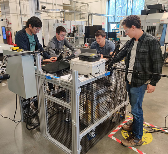 Students using bearing test stand.
