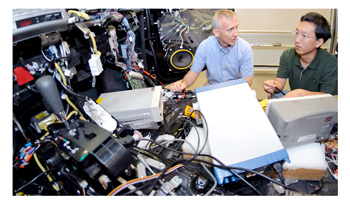 vehicular electronics researchers at work