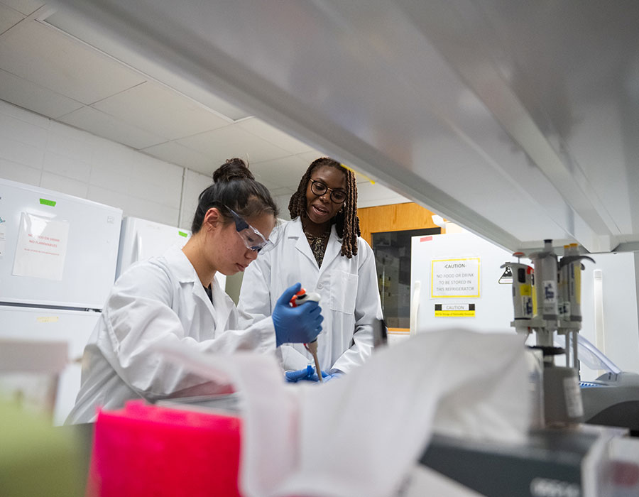 Cottle and student in lab