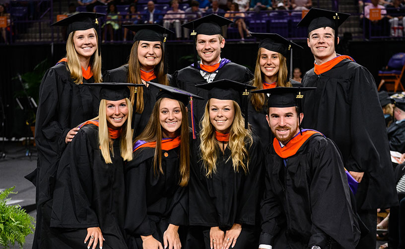 Graduates at ceremony.