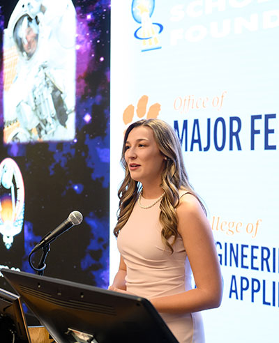 Lauren Davis accepting Astronaut Fellowship